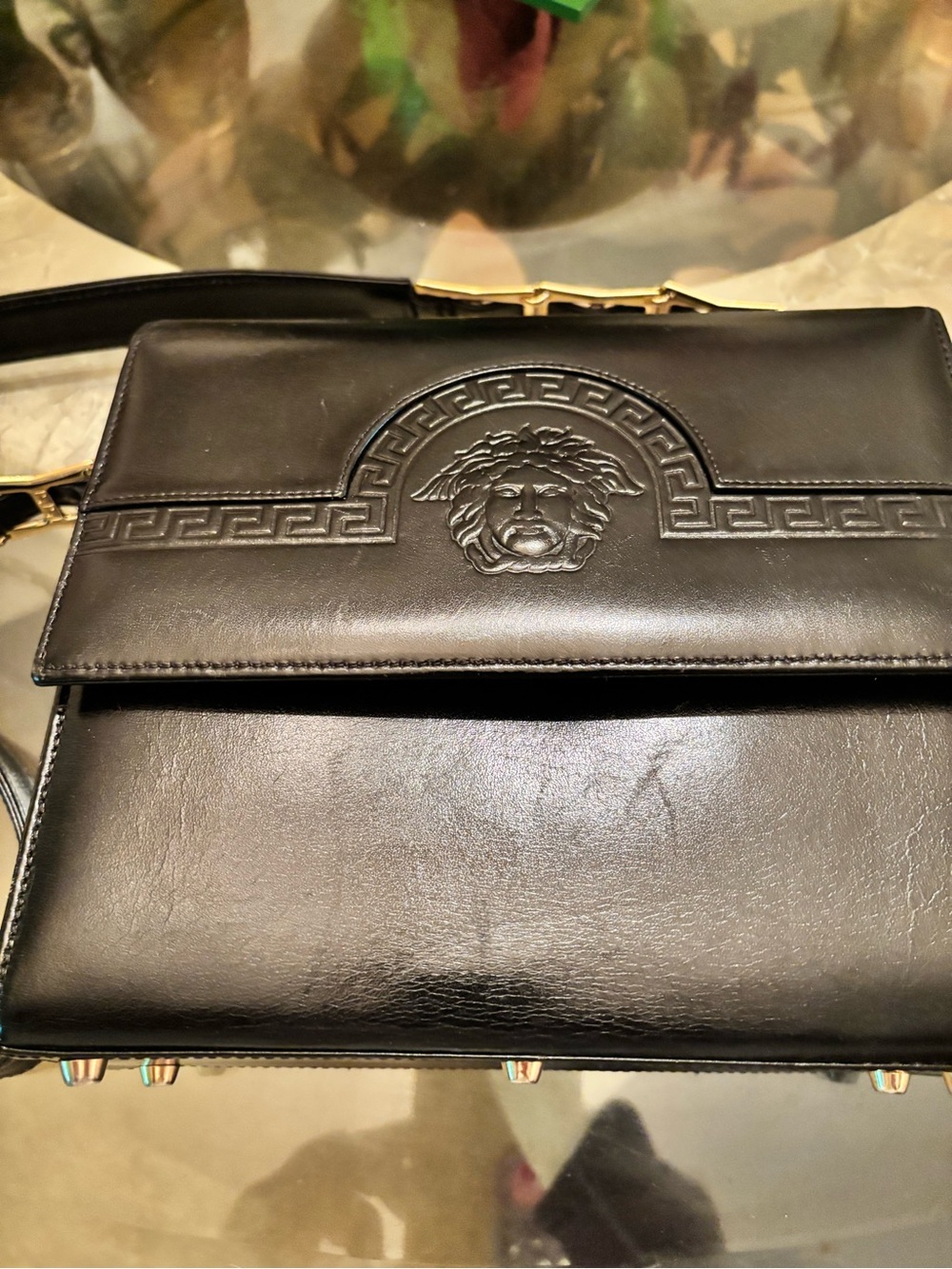 Versace Black Leather Messenger Bag with Embossed Medusa and Gold-Tone Accents
